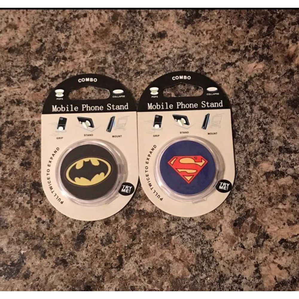 Superman and Batman mobile phone stand‎